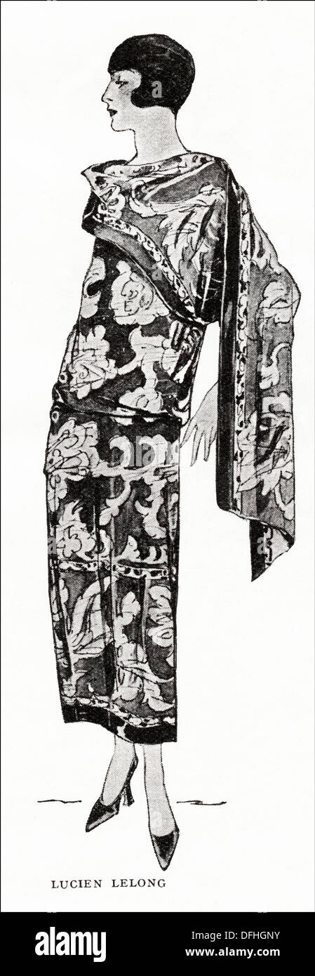 La mode garçonne des années 1920. Batik coloré design fait de travail redingote marron foncé avec châle crêpe de Chine par créateur Lucien Lelong. Illustration originale d'un magazine de mode féminine vers 1924 Banque D'Images