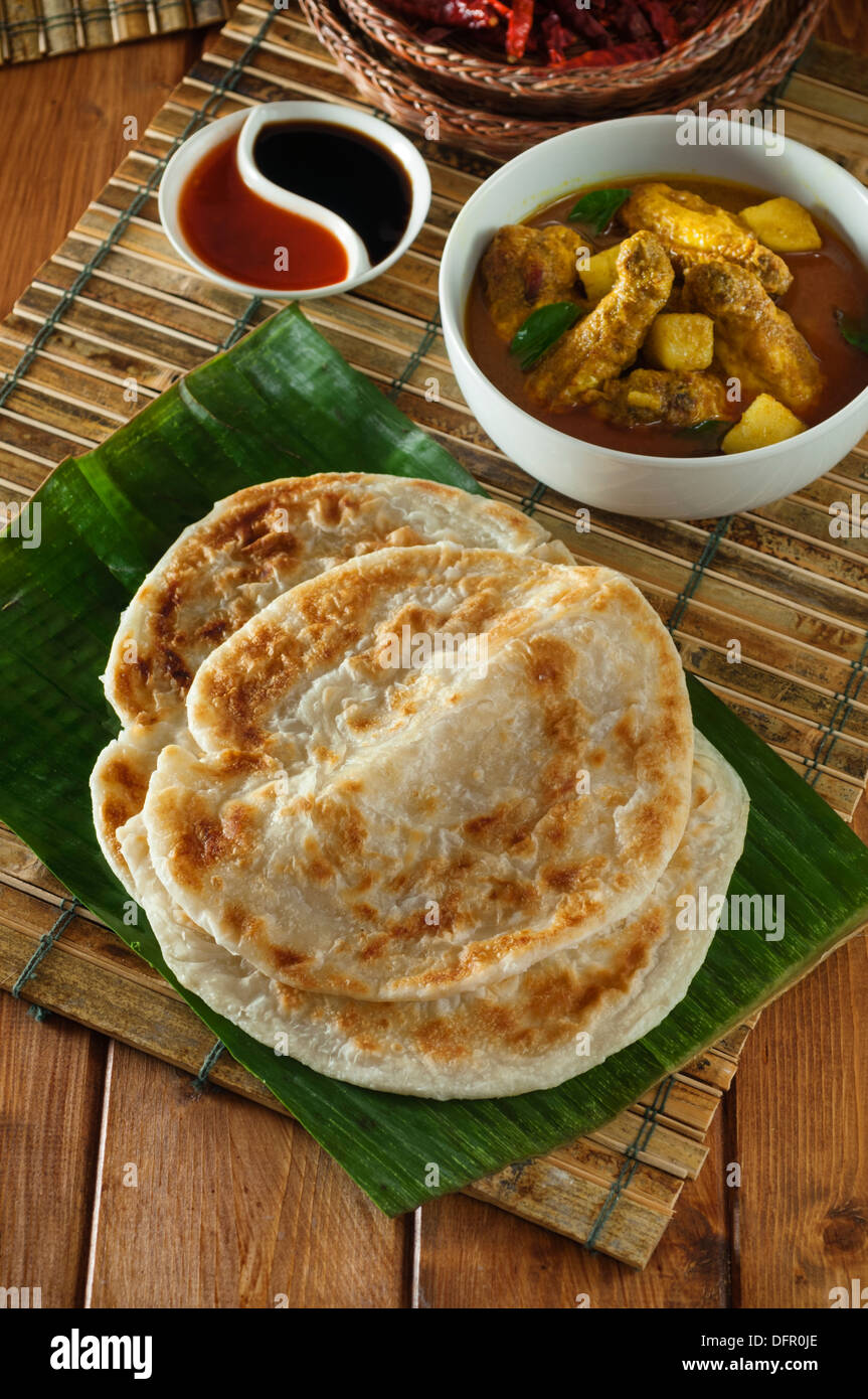 Roti canai et détroits chicken curry alimentaire Malaisie Banque D'Images