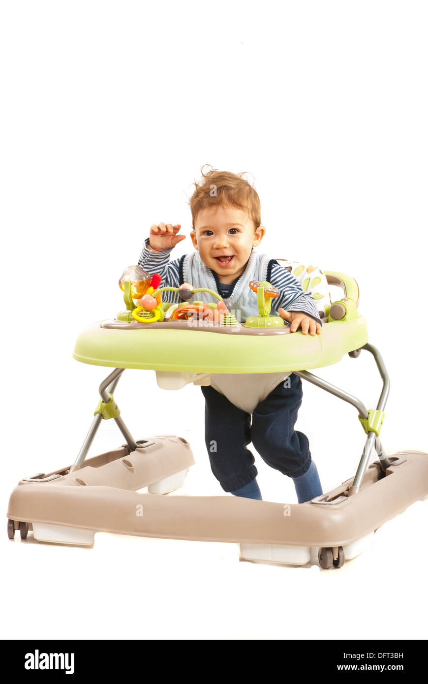 Happy Baby Boy in walker isolé sur fond blanc Banque D'Images