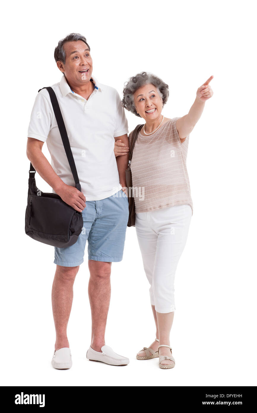 Cheerful senior couple looking at view Banque D'Images
