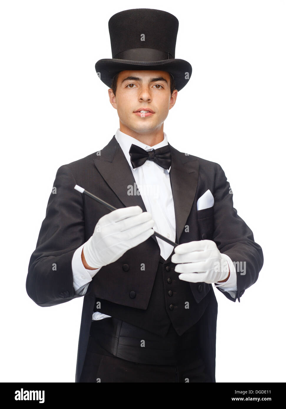 Magicien dans top hat avec Magic wand montrant trick Banque D'Images