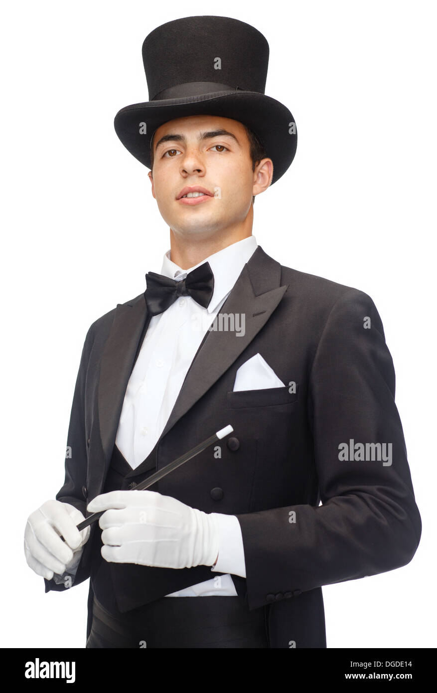 Magicien dans top hat avec Magic wand montrant trick Banque D'Images