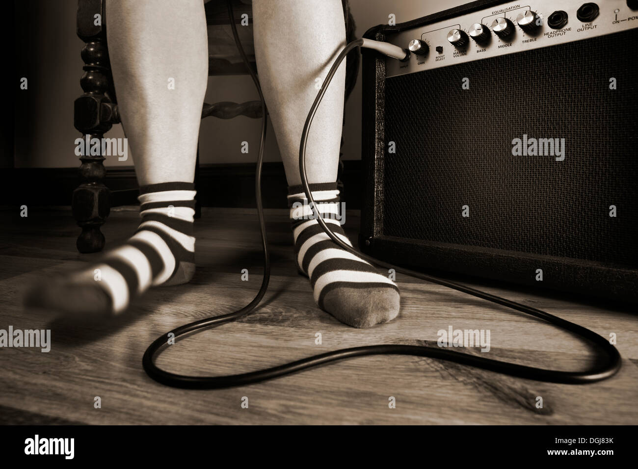 Pieds dans un temps avec la musique. Banque D'Images