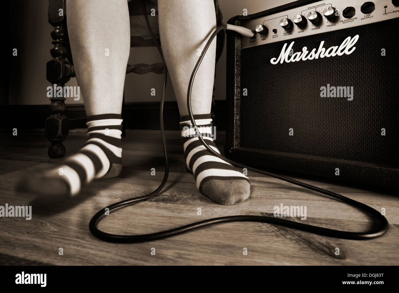 Pieds dans un temps avec la musique. Banque D'Images