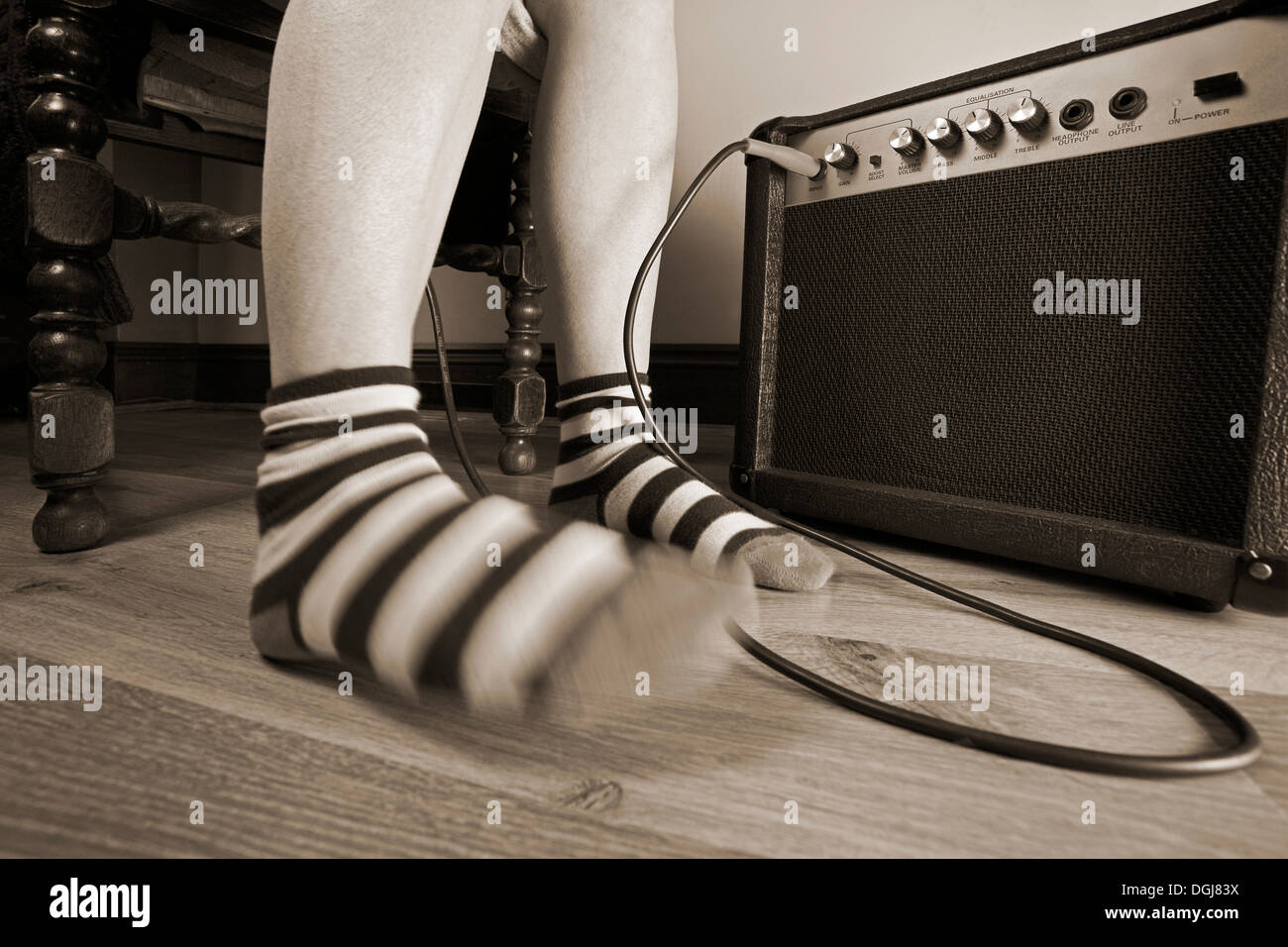Pieds dans un temps avec la musique. Banque D'Images