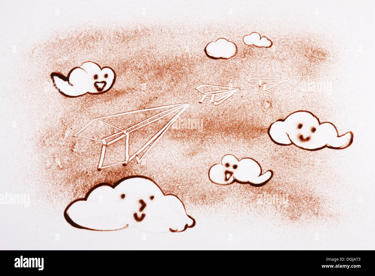 Un dessin sur sable de nuages dans le ciel Banque D'Images