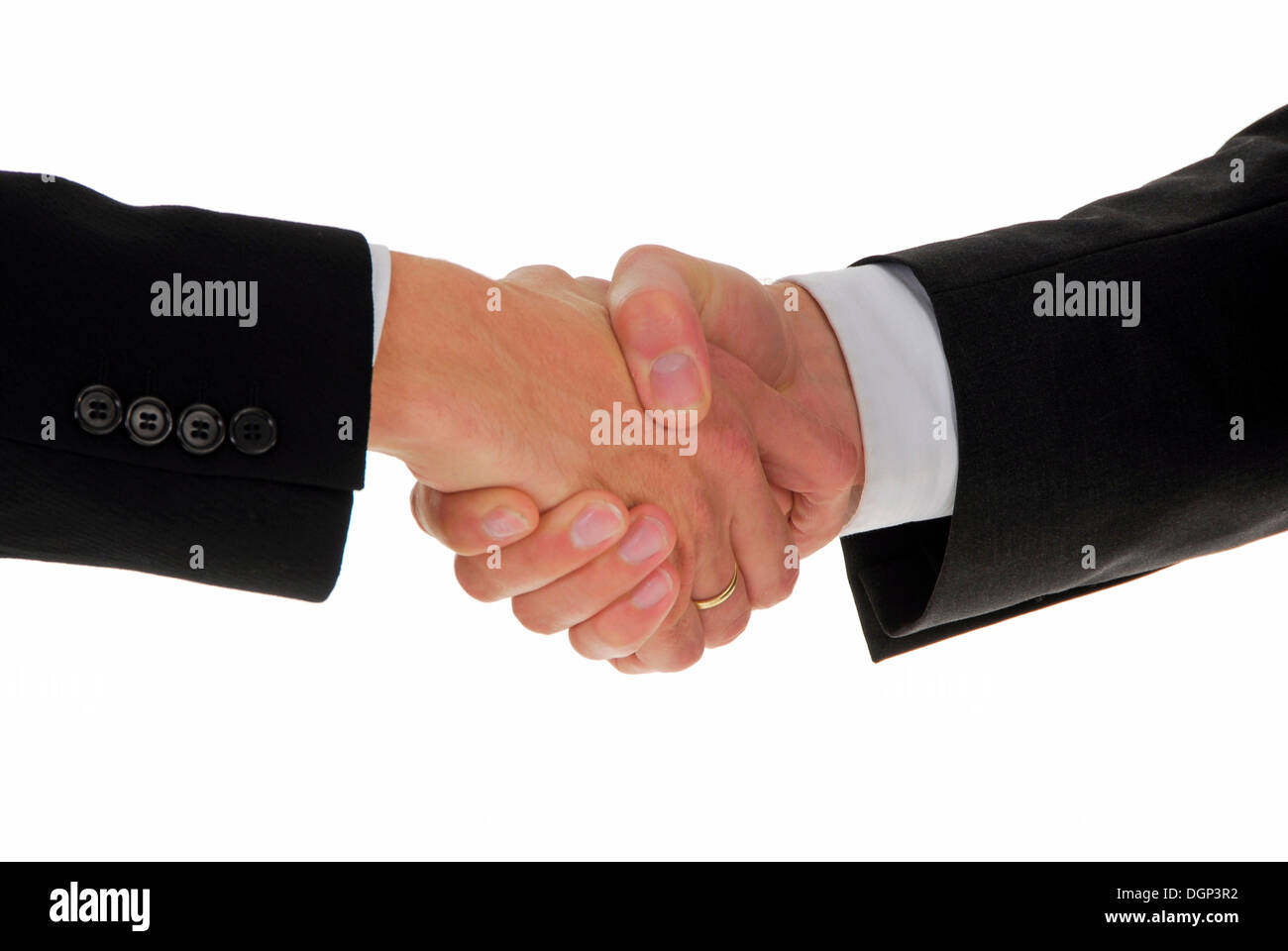 Deux hommes se serrant la main, image symbolique pour sceller une transaction d'affaires Banque D'Images