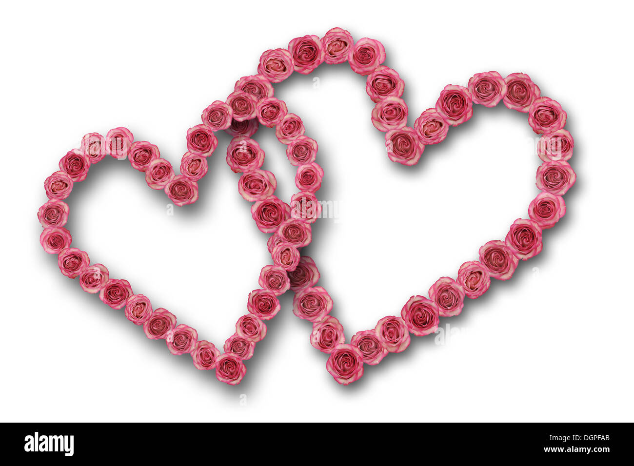 Deux coeurs faits avec des fleurs rose Banque D'Images