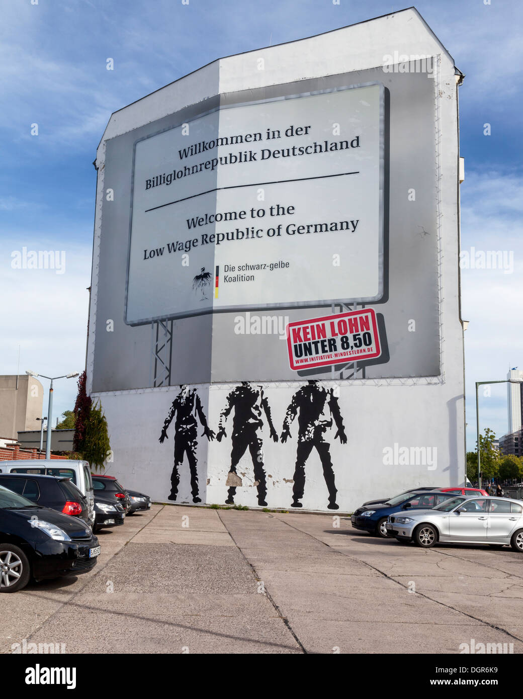 Salaire minimum politique 'l'affiche aucun salaire 8,50 euros' et trois hommes sans tête mural - Berlin Banque D'Images