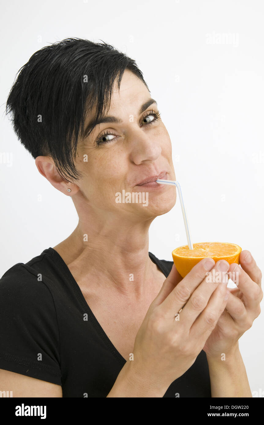 Smiling pour sweet orange Banque D'Images
