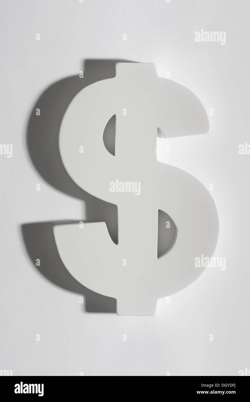 Un bloc blanc dollar sign, close-up Banque D'Images