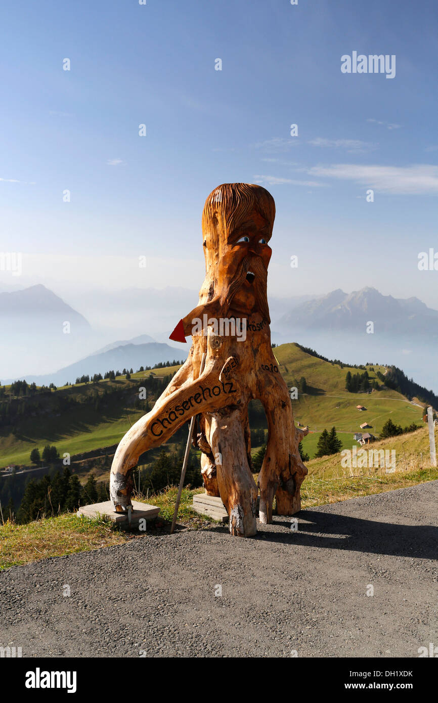 Figure en bois comme guide d'une fromagerie, Rigi, Suisse, Europe Banque D'Images