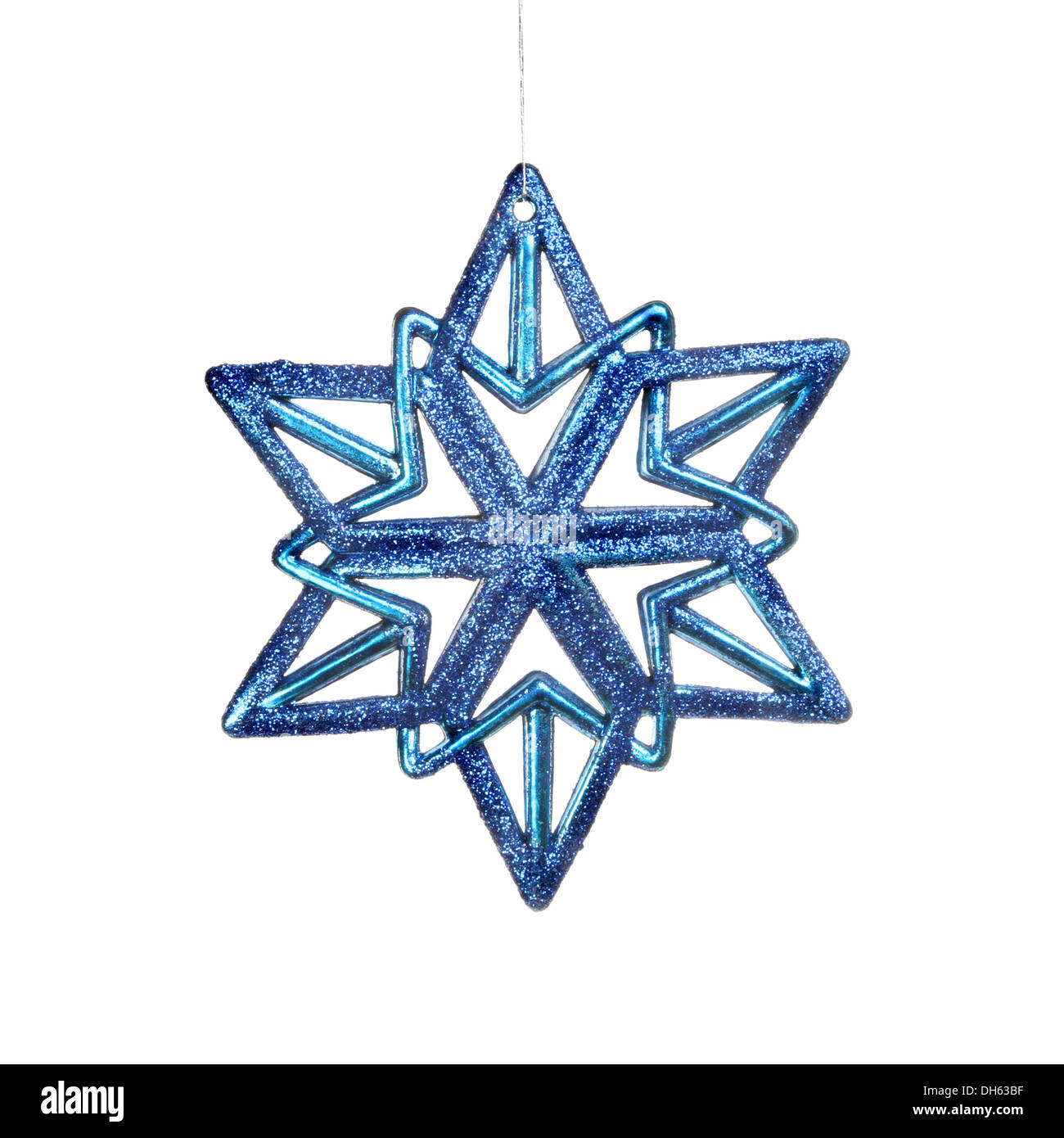 Décoration étoile de Noël paillettes bleu isolés contre white Banque D'Images