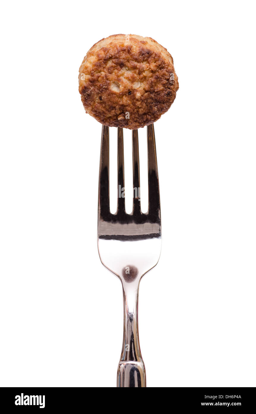 Isolé blanc sur une fourchette de boulettes Banque D'Images