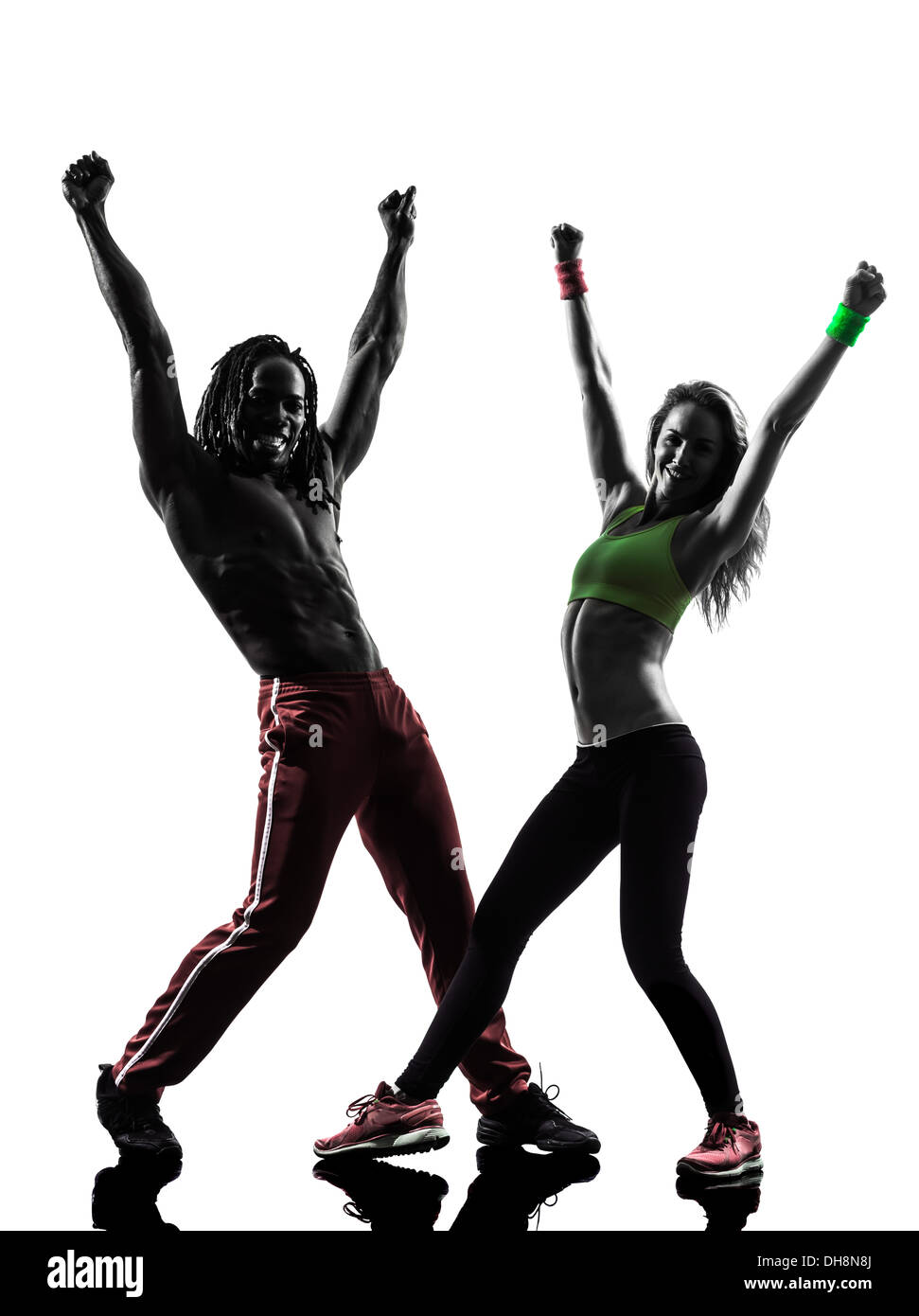 Couple homme et femme l'exercice de danse zumba fitness en silhouette sur  fond blanc Photo Stock - Alamy