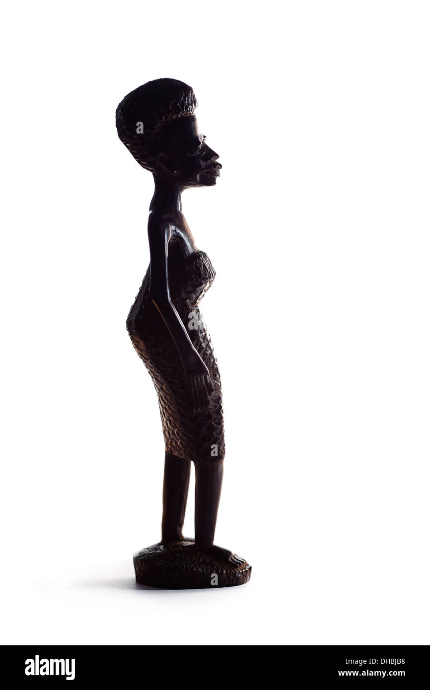 Silhouette de Statuette africaine de Girl Over White Background Banque D'Images