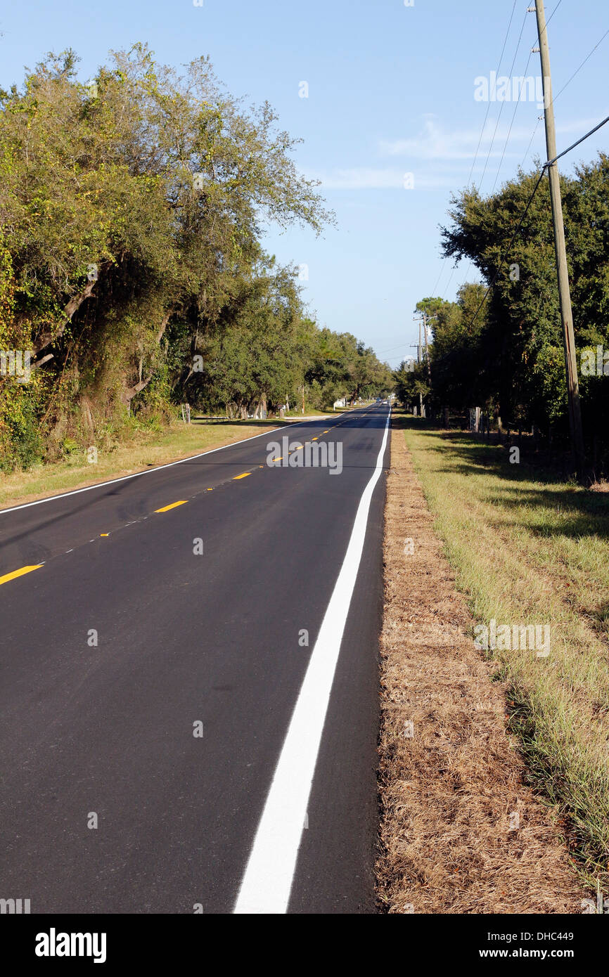 Vide longue route dans Davenport Florida, 6 novembre 2013 Banque D'Images