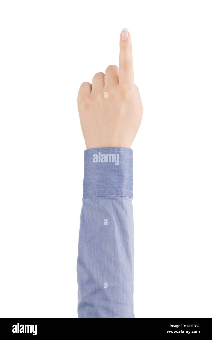 L'index de la main d'une femme dans une chemise est de toucher l'écran virtuel sur un fond blanc, vue du dessus. Banque D'Images