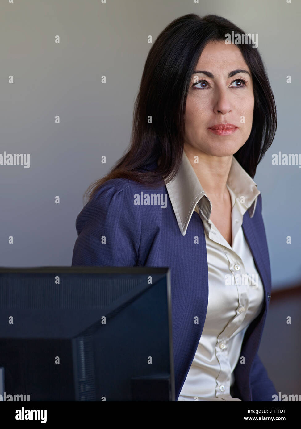Portrait of businesswoman wearing jacket et chemisier. Banque D'Images