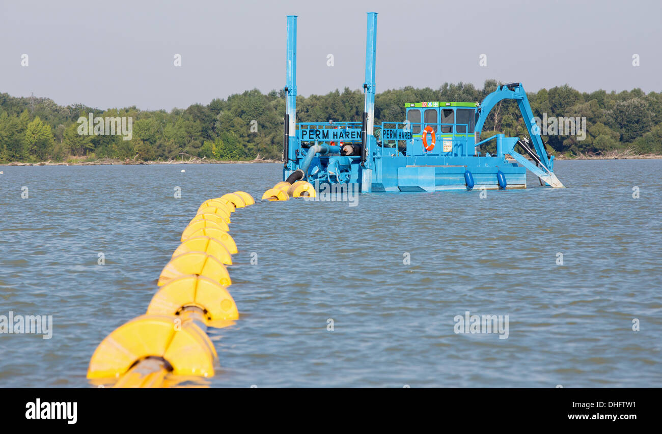 Les tuyaux d'eau et de l'excavateur Banque D'Images