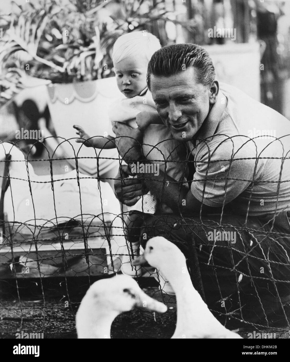 Kirk Douglas sur-ensemble du film, des étrangers lorsque nous nous réunirons, 1960 Banque D'Images
