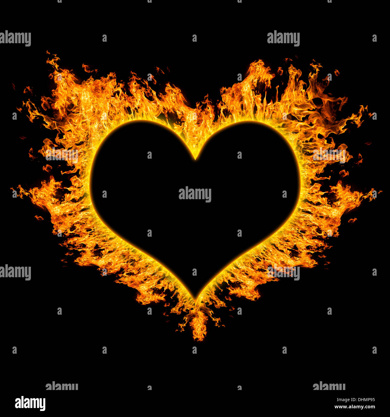 Fiery coeur sur fond noir. Banque D'Images