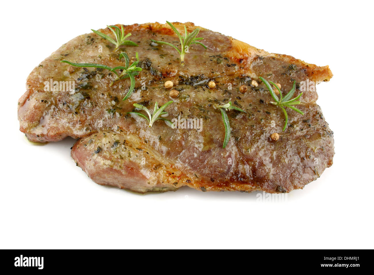 Steak grillé mariné dans le cou d'herbes, isolé Banque D'Images