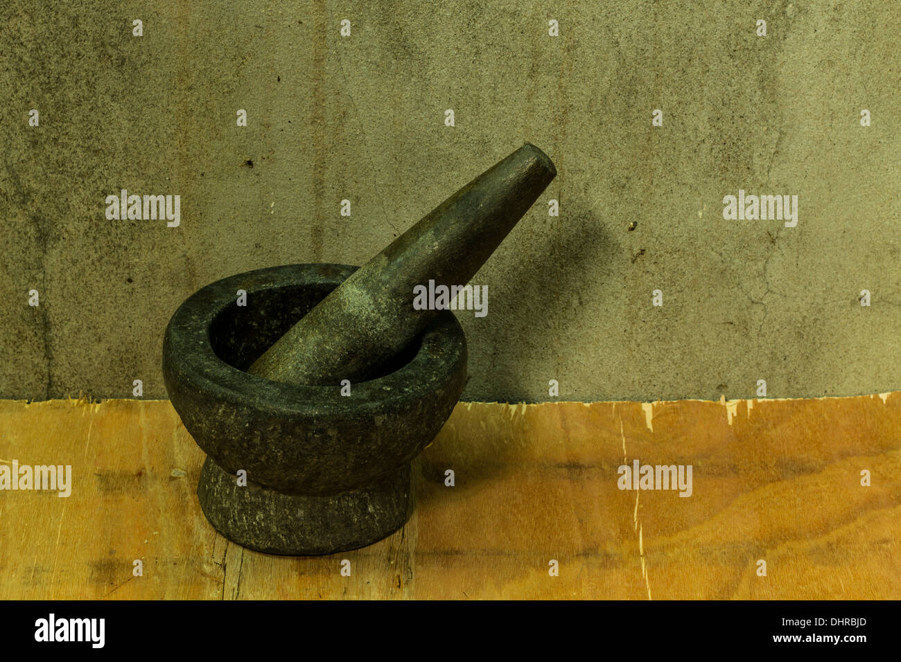 Mortier et pilon en pierre Banque D'Images