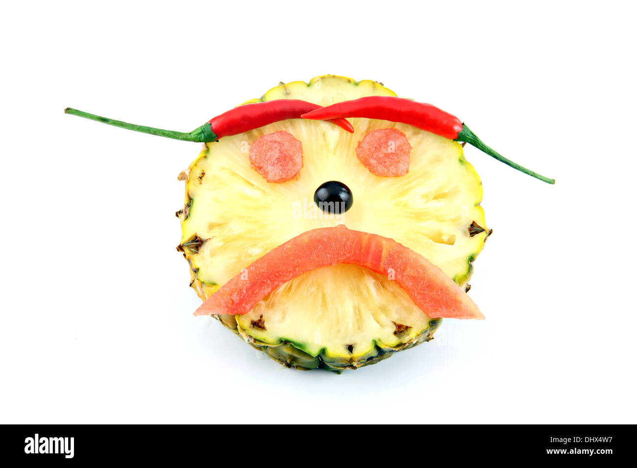 Malheureusement, face à des images représentant l'Émotion ​​From mix fruits sur fond blanc. Banque D'Images
