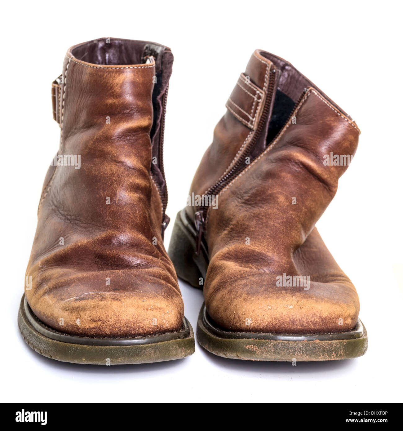 Vieilles bottes usées isolated over white background Banque D'Images