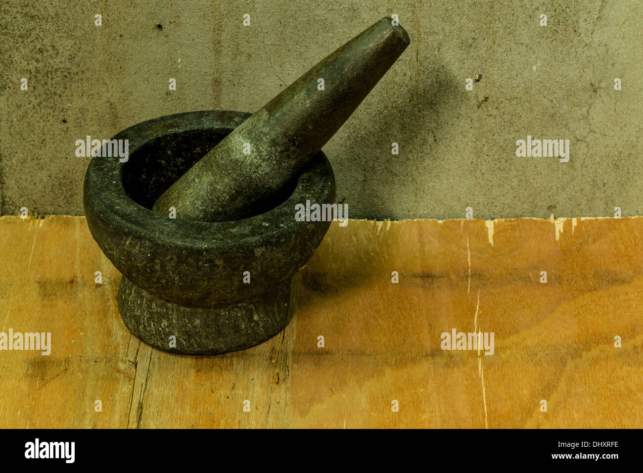 Mortier et pilon en pierre Banque D'Images
