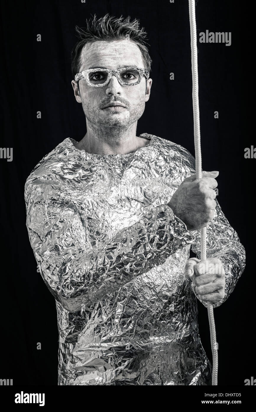 Portrait of man holding exotiques de la corde. Banque D'Images