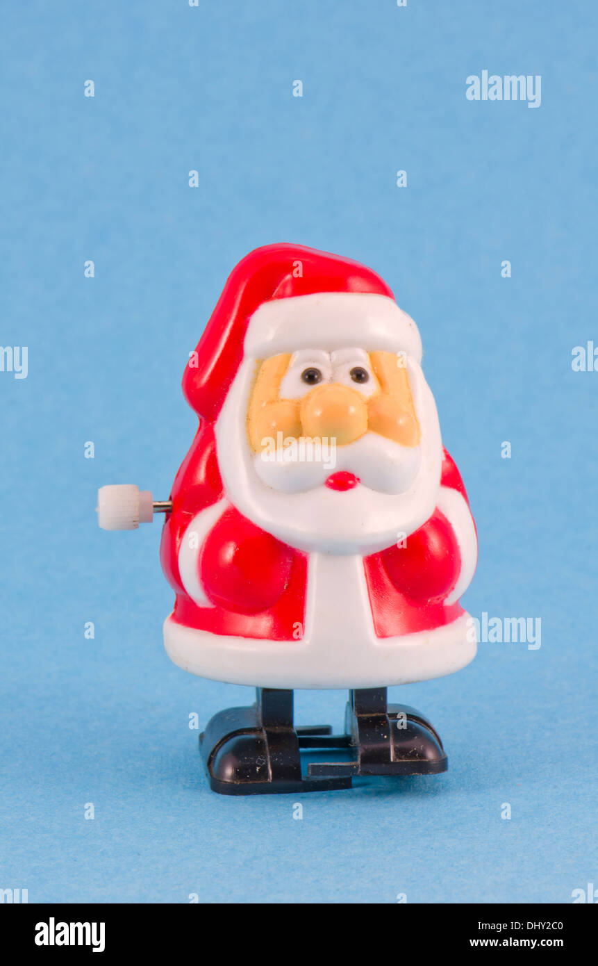 Petit bonhomme de neige de Noël jouet mécanique en plastique sur fond bleu  Photo Stock - Alamy