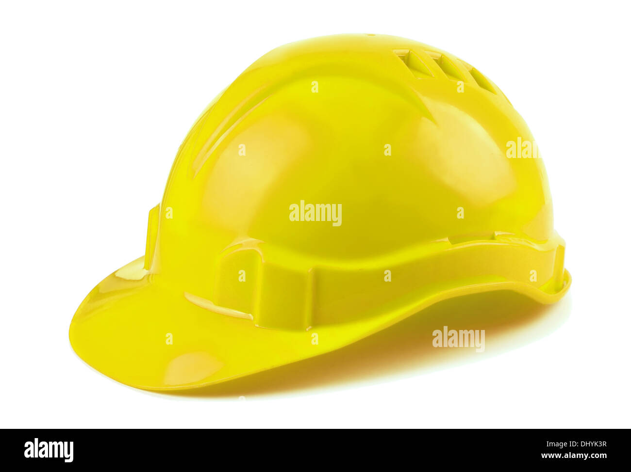 Casque de construction jaune sur fond blanc Banque D'Images