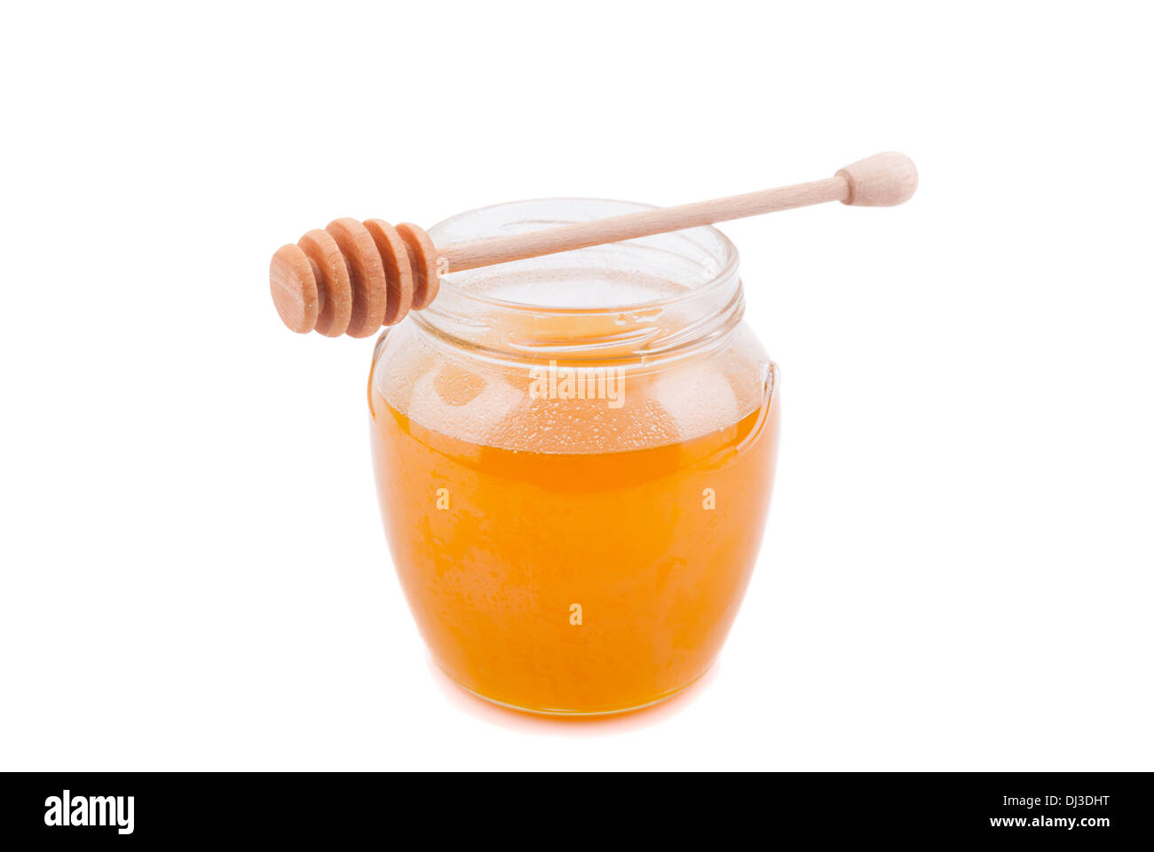 Le miel dans un pot de verre. Banque D'Images