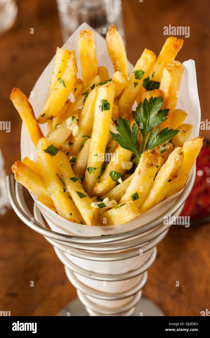 L'ail et persil frites avec du ketchup Banque D'Images