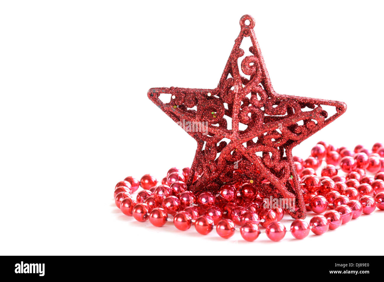 étoile Rouge De Noël Avec Ruban Sur Fond Blanc Banque D