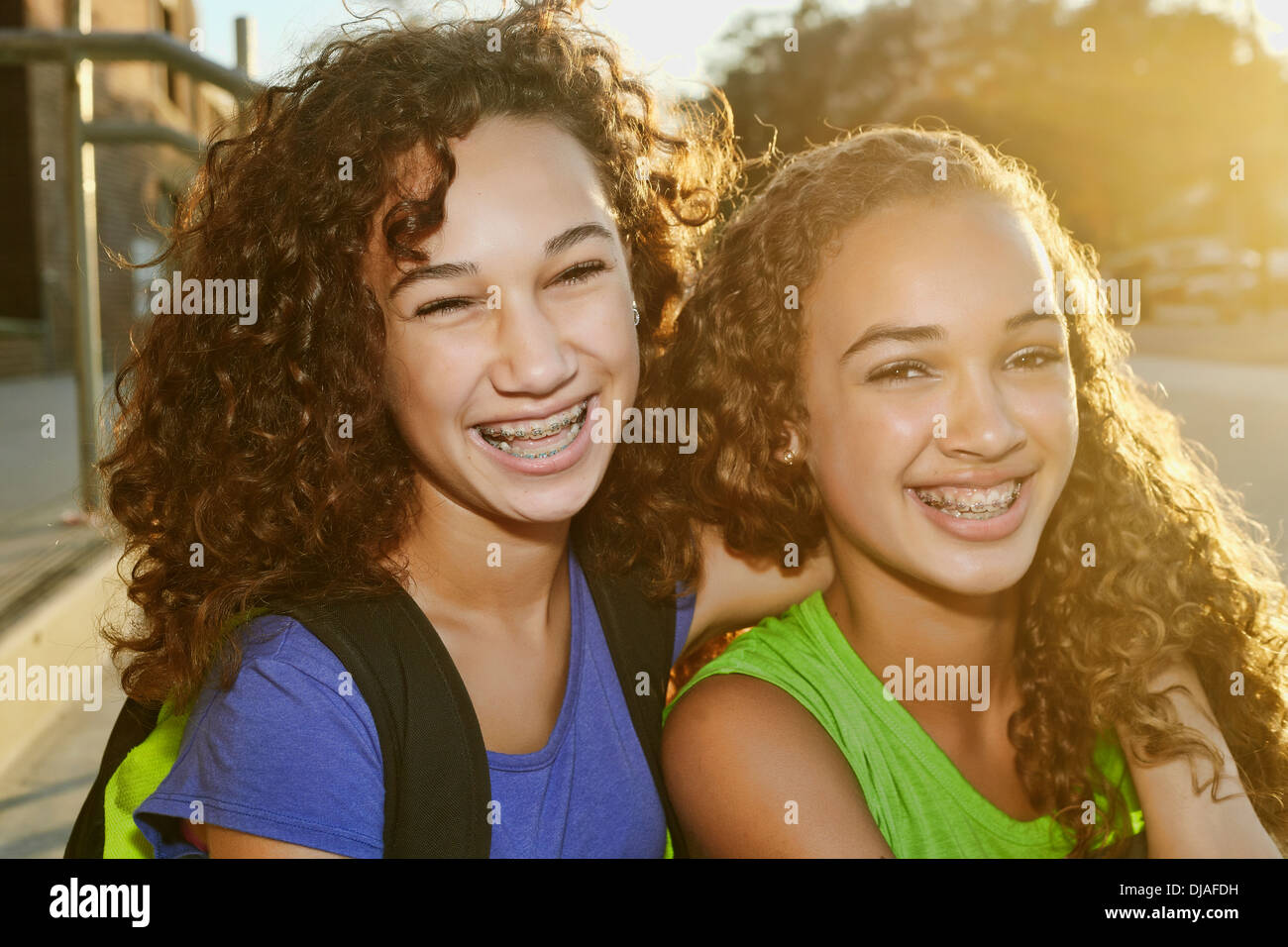Mixed Race girls smiling Banque D'Images
