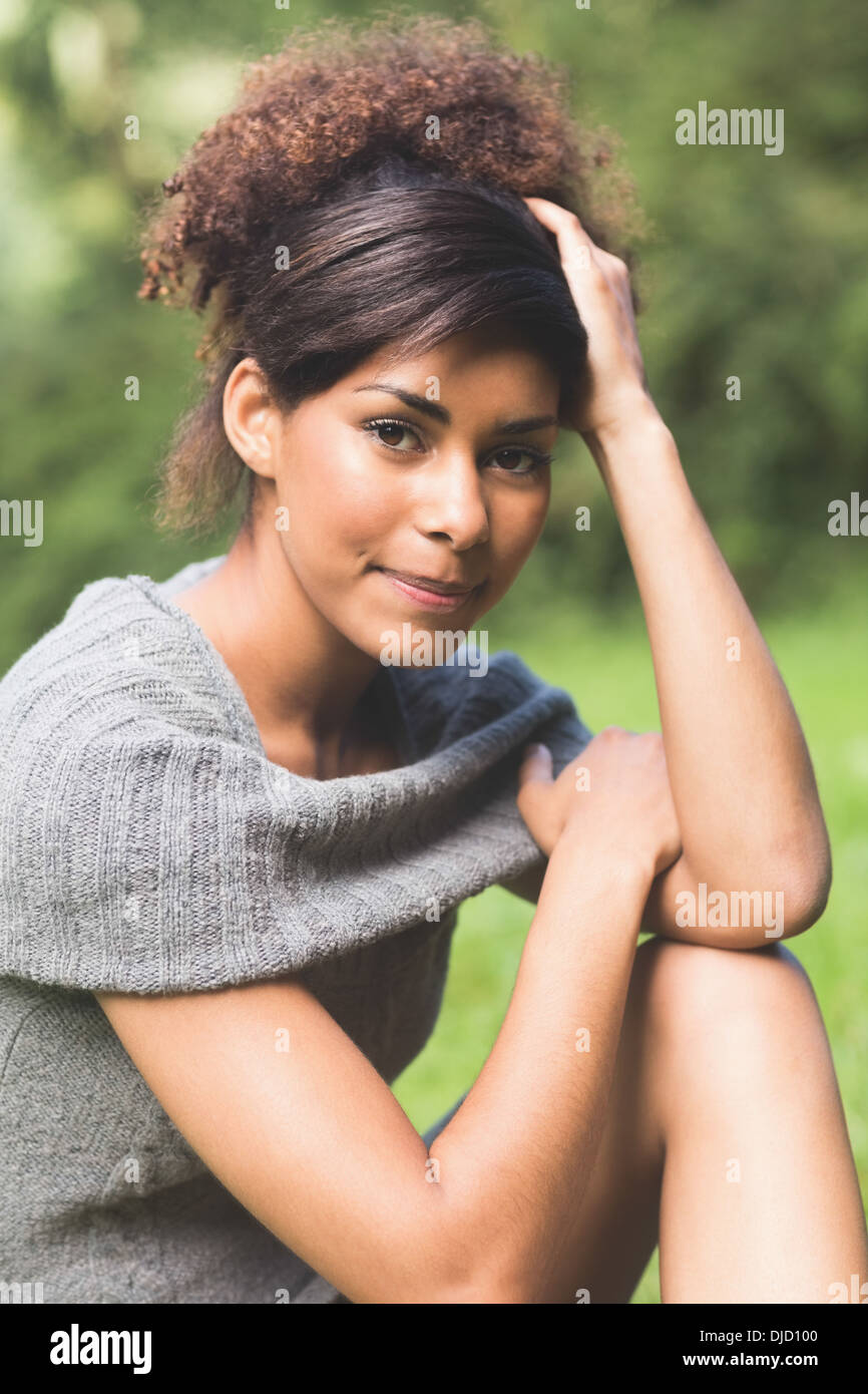 Gorgeous brunette smiling at camera Banque D'Images