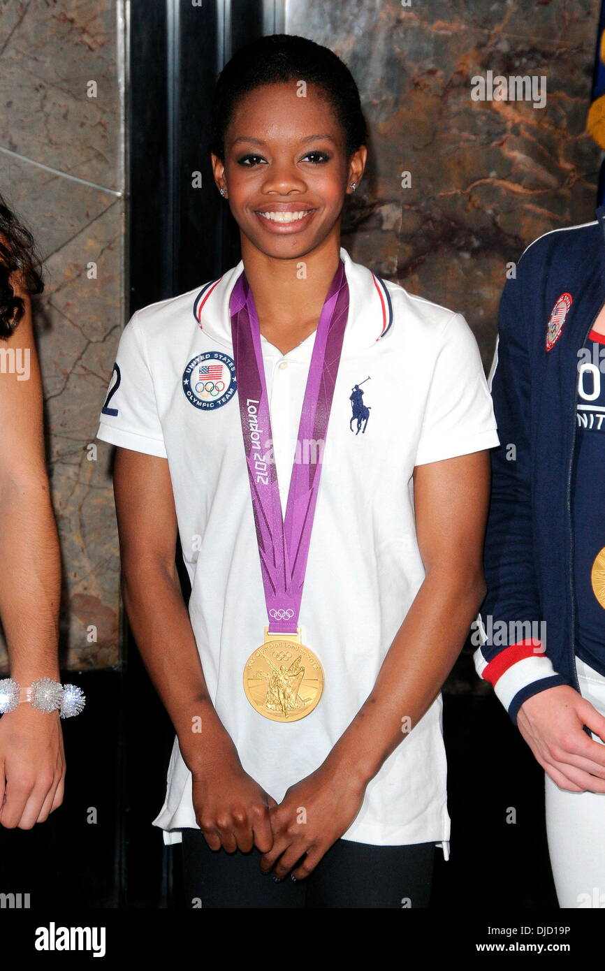 Gabby Douglas US Women's Gymnastics équipe participant à une cérémonie d'éclairage à l'Empire State Building New York City, USA - 14.08.12 Banque D'Images