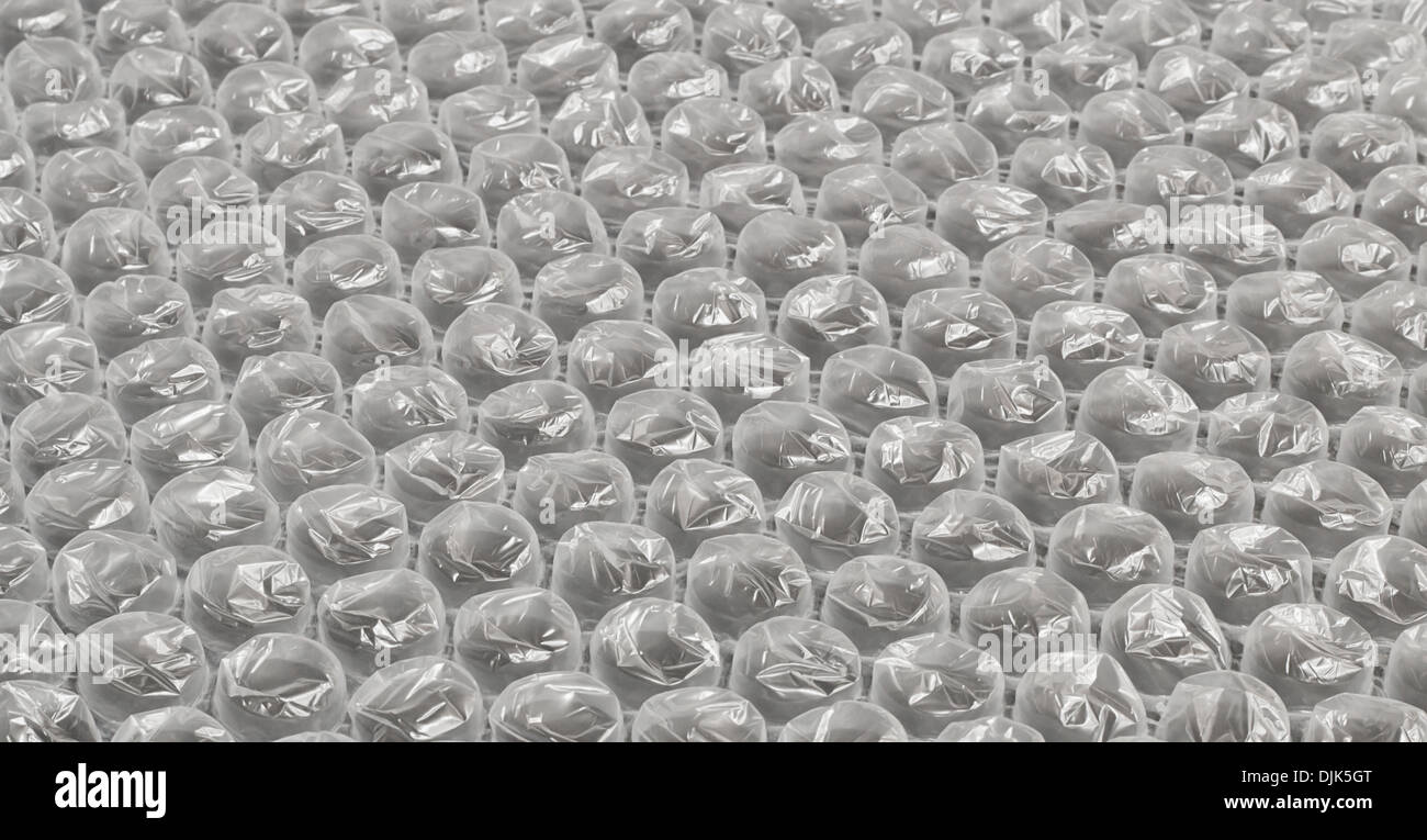L'enveloppe de bulle en plastique souvent utilisé en arrière-plan dans l'emballage des objets fragiles pour une livraison à la poste Banque D'Images