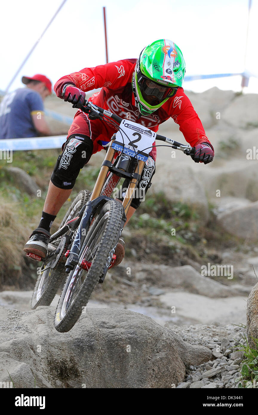 Vtt de descente sud-africain Greg Minnaar racer compétitive dans une Coupe du Monde de vélo de montagne UCI à Fort William, Écosse. Banque D'Images