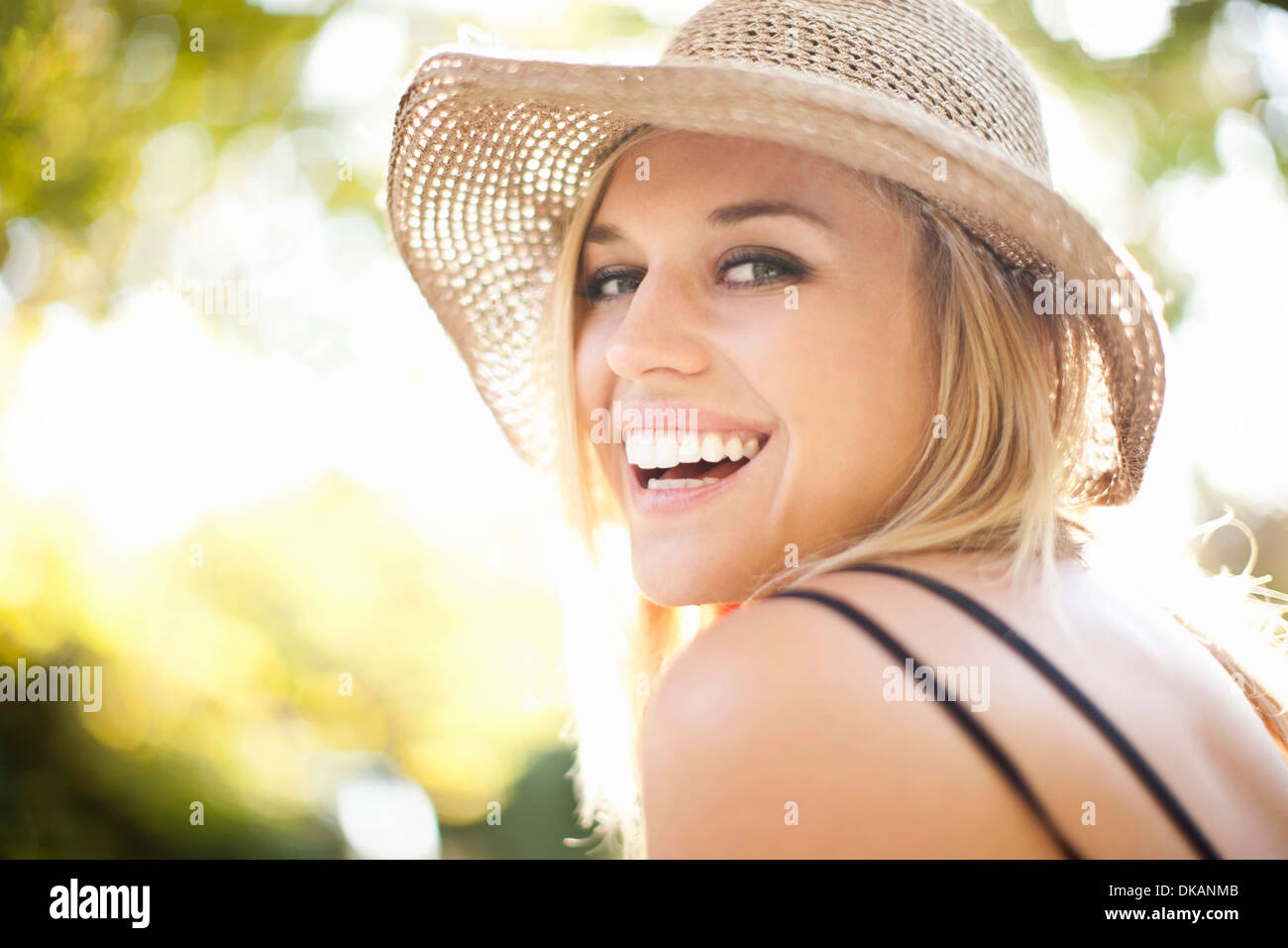 Close up portrait of young woman in park Banque D'Images