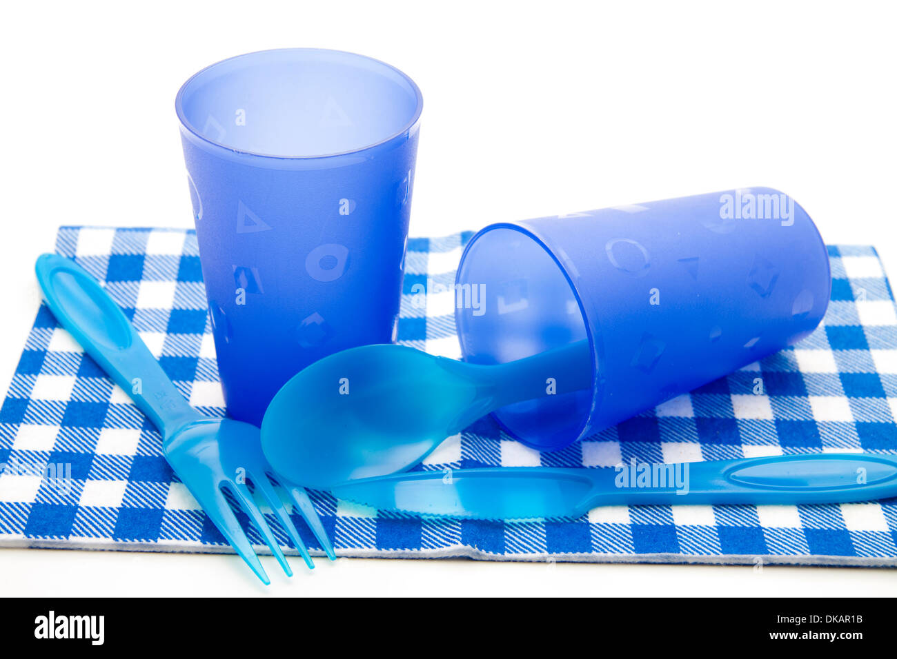 Tasses de boisson bleu avec couverts Banque D'Images