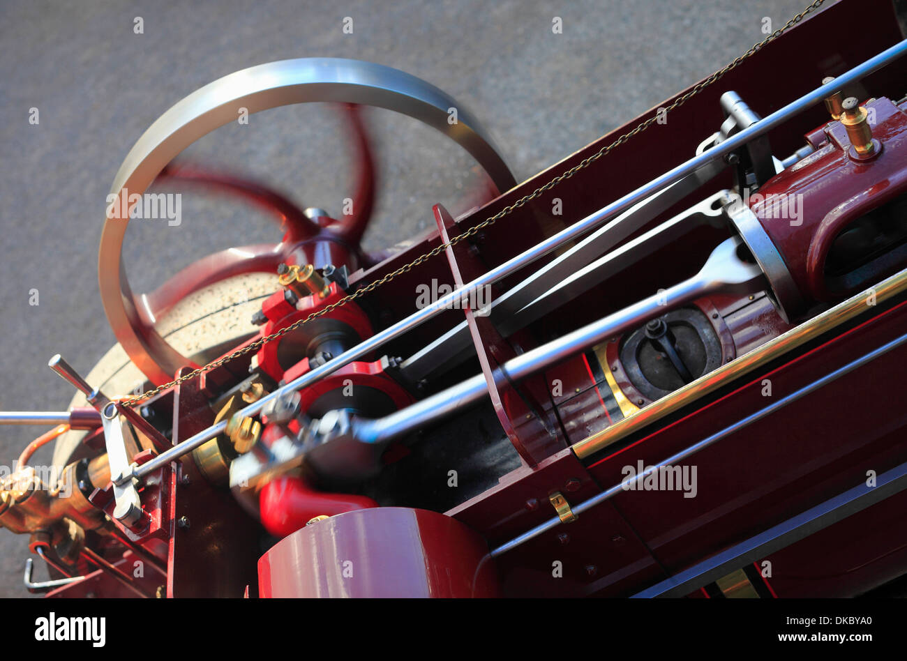 Volant moteur et close up des pièces en mouvement d'un petit moteur de traction. Banque D'Images