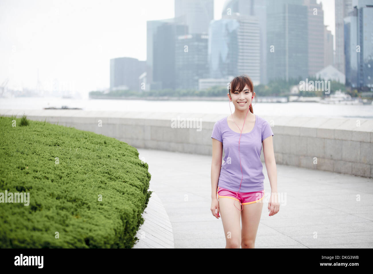 Female jogger à Shanghai, Chine Banque D'Images