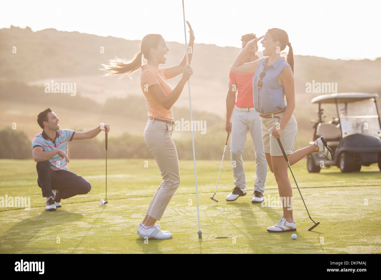 Haut femmes golf sur fiving Banque D'Images