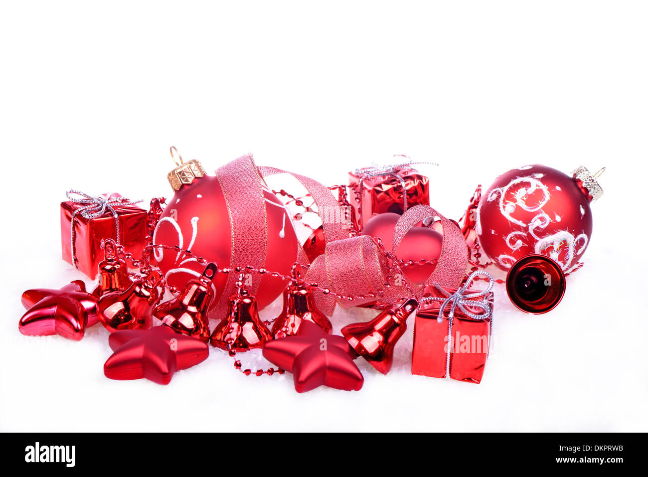 Fond de Noël avec des boules rouges, cloches et étoiles Banque D'Images