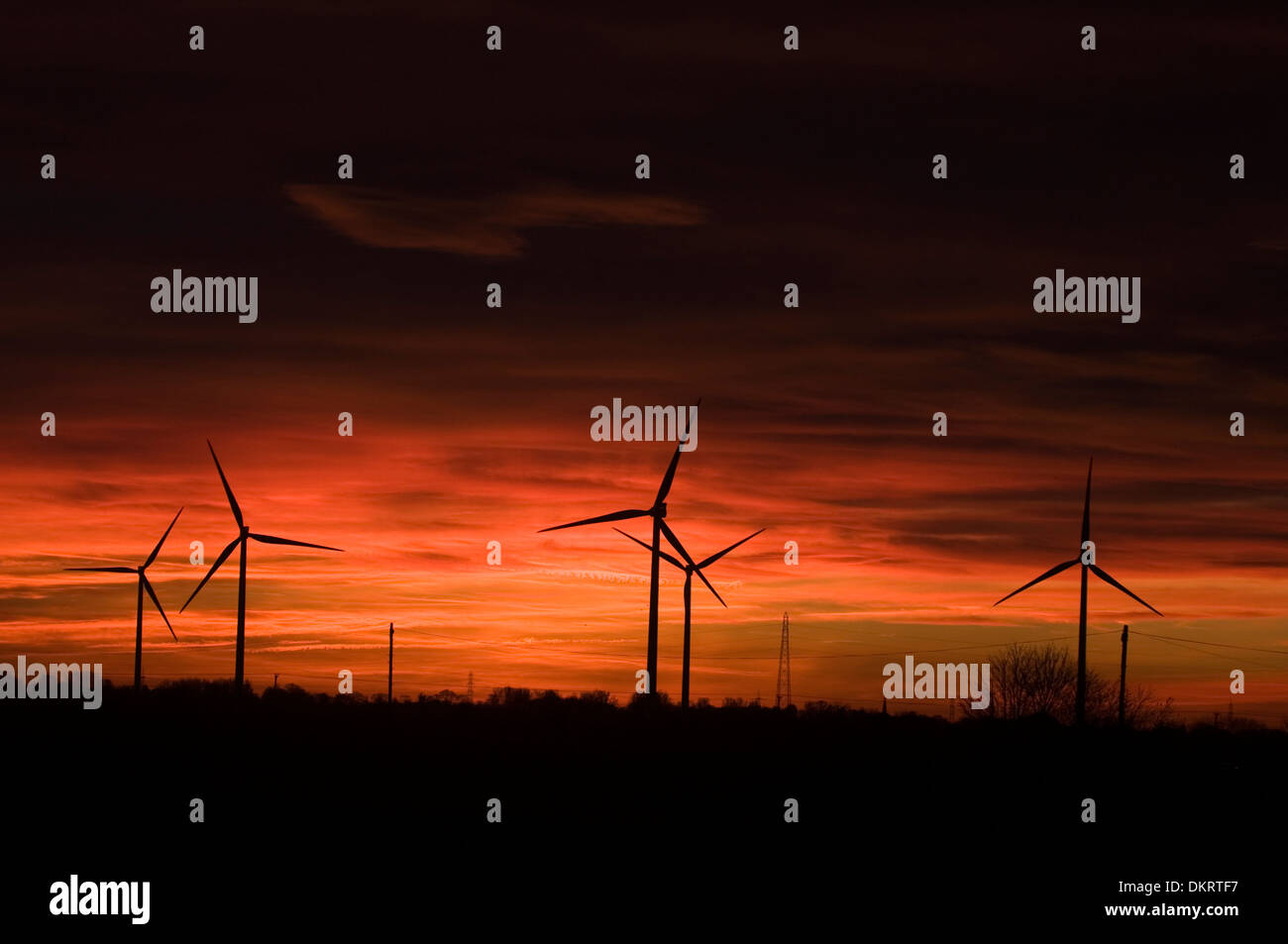 Les subventions d'éoliennes subventionnées puissance tarif tarifs vert des factures d'entreprises d'énergie de l'électricité loi couchers de soleil turbi Banque D'Images