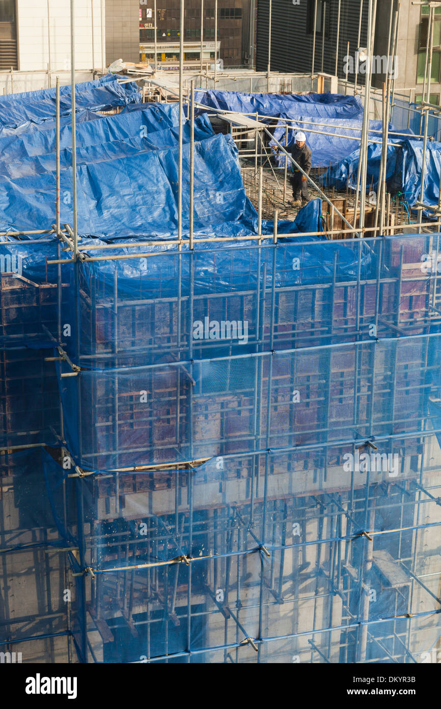 Construction en hauteur sur la construction d'un filet de sécurité - Séoul, Corée du Sud Banque D'Images